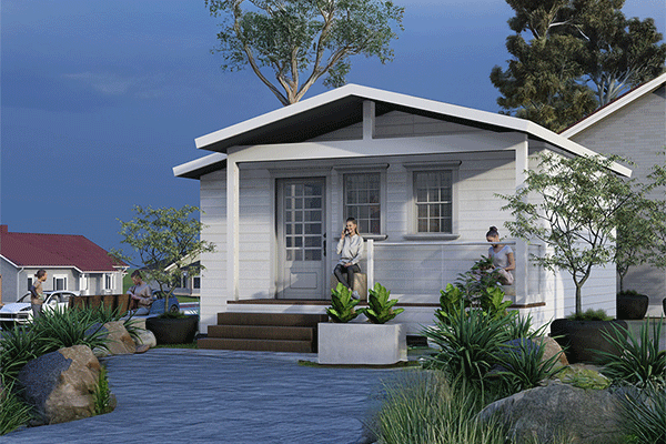 Suburban home built with Simplus Systems, woman enjoying comfort on front porch